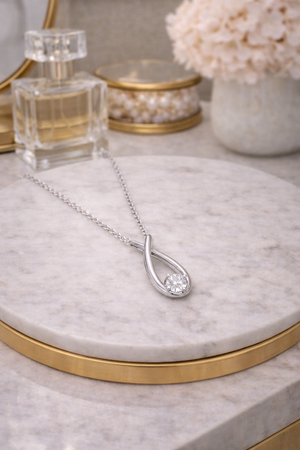 Contemporary Kiss Silver-Plated CZ Pendant Necklace