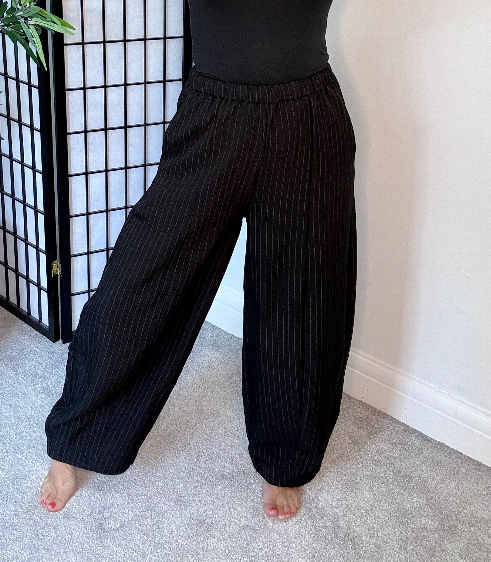 Black pinstripe barrel trousers