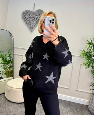 Model wearing lurex star v-neck jumper available at www.susiesboutique.co.uk