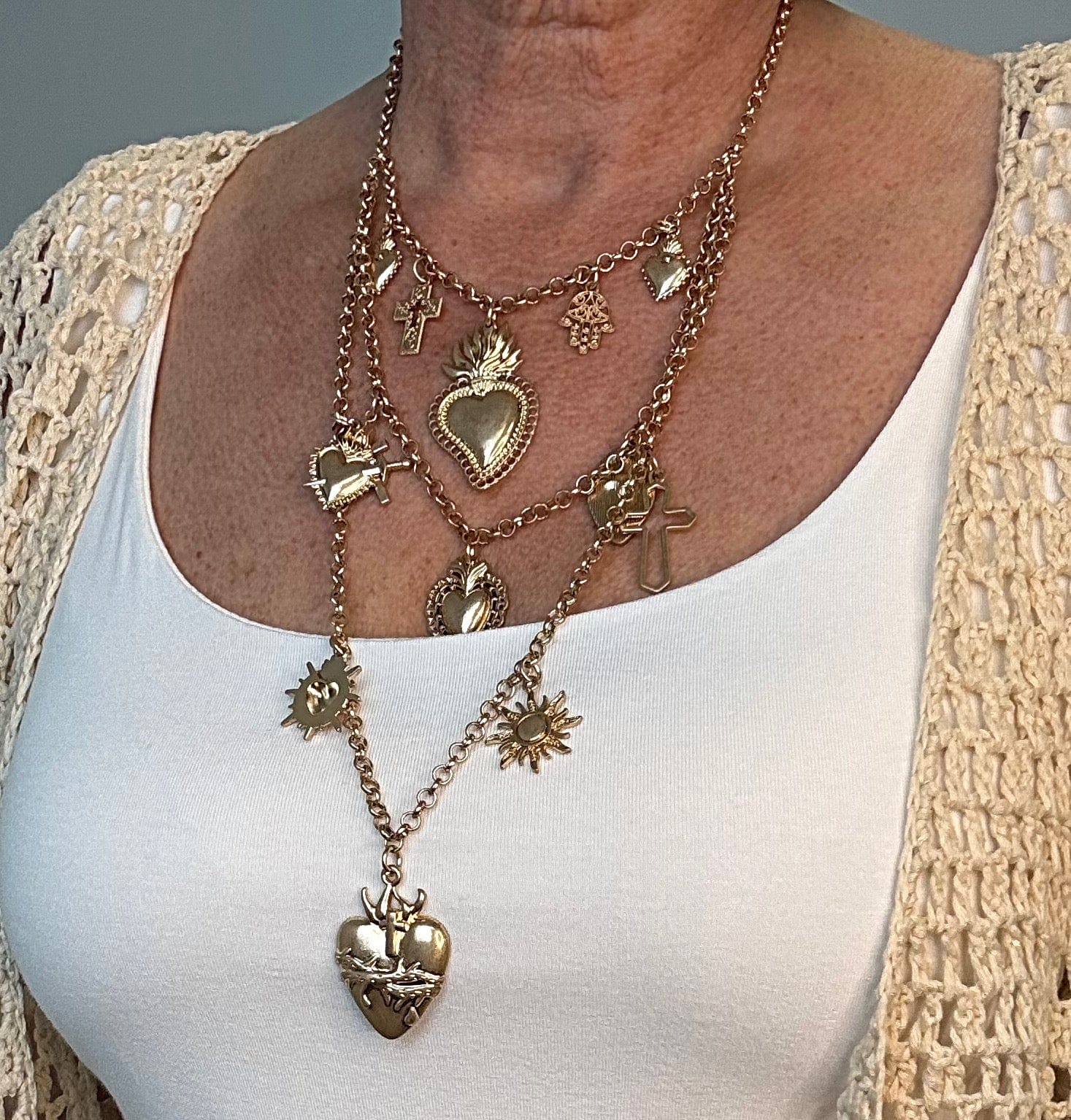 Heart & Charm Layered Necklace – Crosses & Suns Gold - Susie's Boutique - | Women's Fashion Online