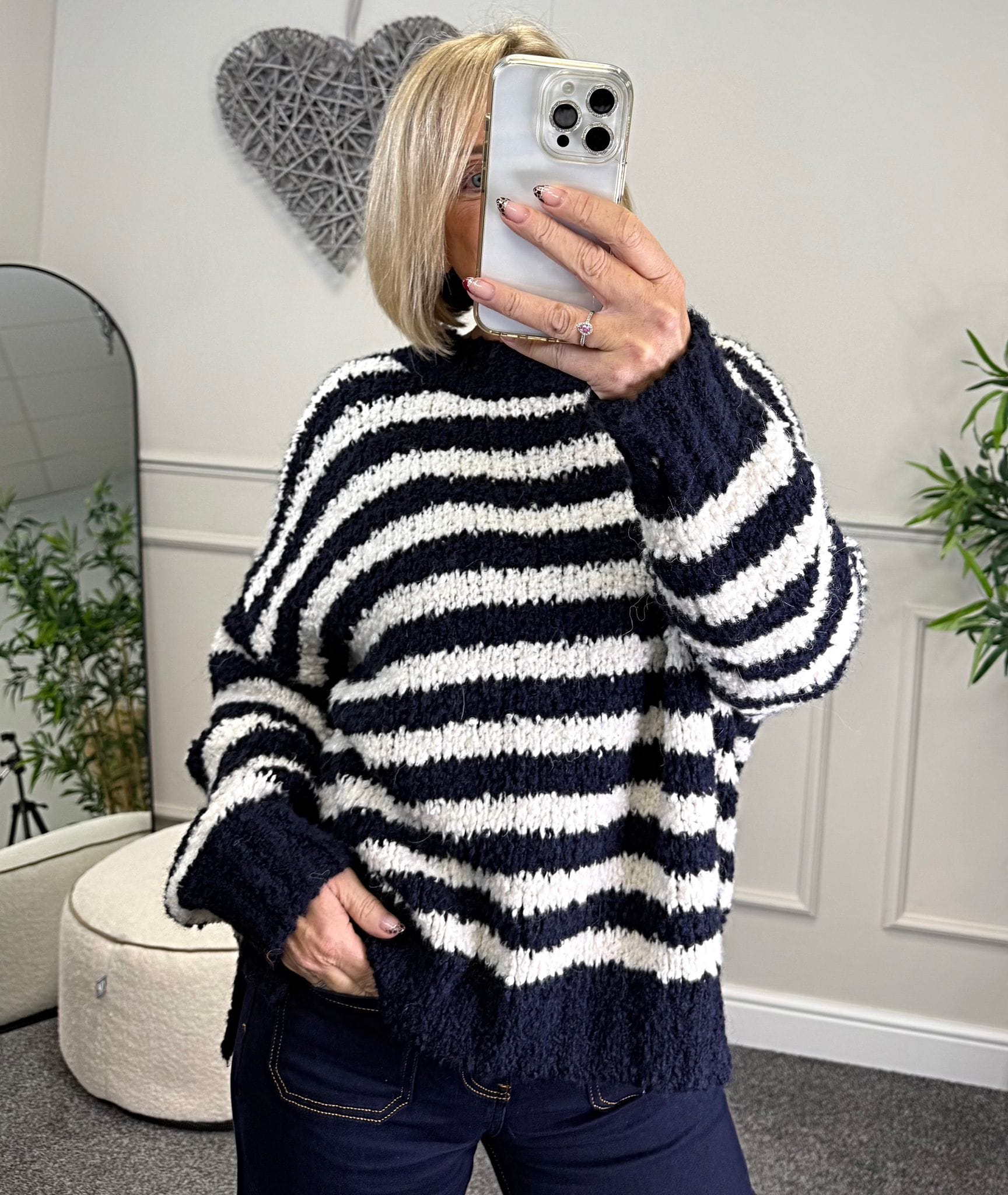 Susie wearing navy and white stripe jumper with jeans