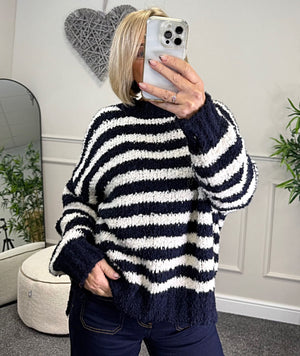 Susie wearing navy and white stripe jumper with jeans